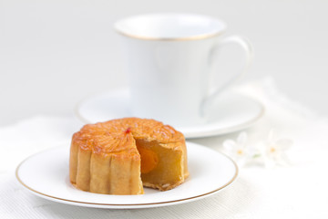 Moon cake served with tea