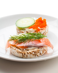 Appetizers with red fish and red caviar