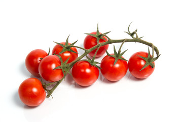 Cherry tomatoes on vine.