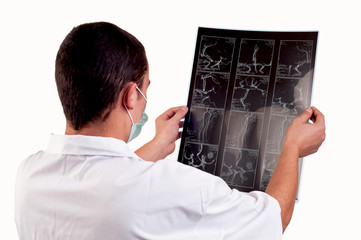 doctor looking at CT computer tomography scan image