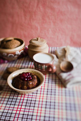 Cranberry cake on the plate in kitchen