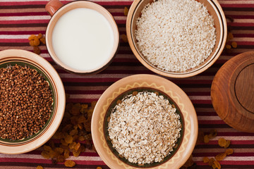 Buckwheat, oat flakes, rice and milk