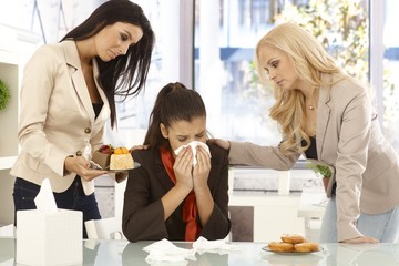 Naklejka premium Crying office worker comforted by colleagues