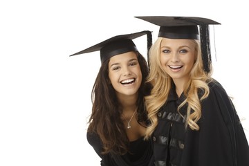 Happy graduates in graduation cap