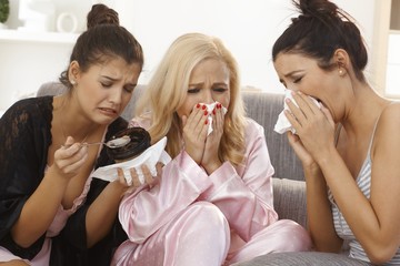 Portrait of crying women at home