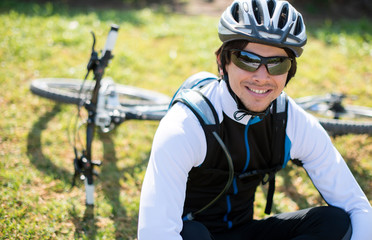 Obraz na płótnie Canvas Happy Young Male Cyclist