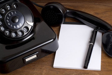 Old Black Telephone and Notepad