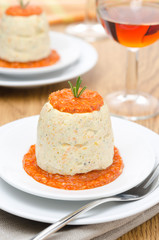 mousse of chicken with pumpkin, green and red pepper sauce