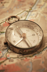 Fototapeta na wymiar Old compass on map