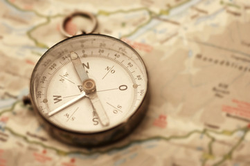 Fototapeta na wymiar Old compass on map