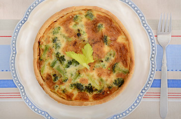 vegetable quiche on plate