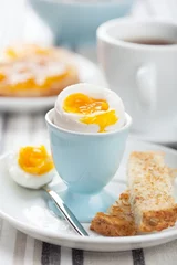 Abwaschbare Fototapete boiled egg for breakfast © Olga Miltsova