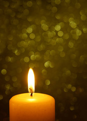 Holiday Candle with glitter background