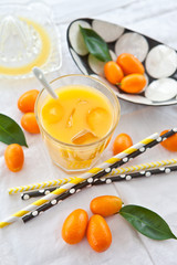 Fresh juice from oranges and kumquats