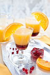 Orange juice with grenadine / tequila sunrise