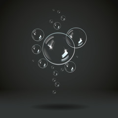 Soap bubbles on a black blue background