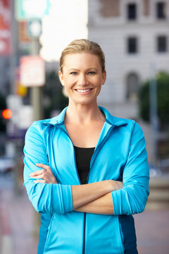 Portrait Of Female Runner On Urban Street