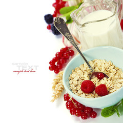 healthy breakfast with bowl of oat flakes