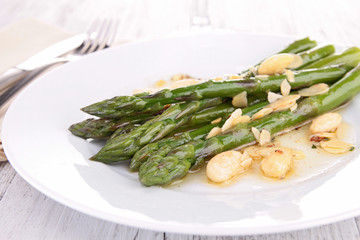 plate of asparagus with almonds
