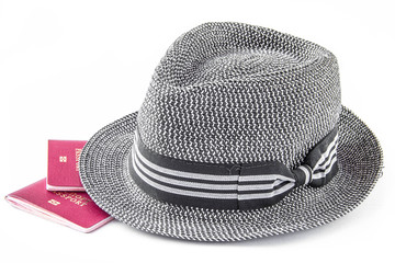 Sun hat and red foreign passport