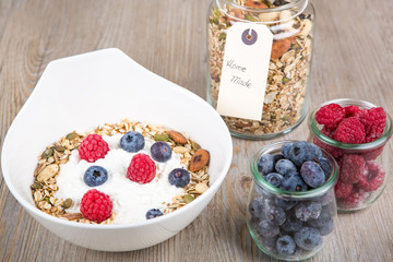 Healthy Breakfast with muesli on textured background