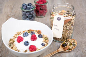 Healthy Breakfast with muesli on textured background