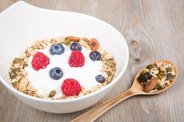 Healthy Breakfast with muesli on textured background
