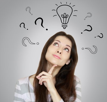 Thinking woman with question signs and light idea bulb above