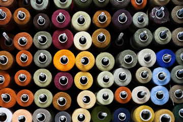 Fototapeta premium Reels with colorful threads