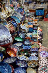 Finely decorated ceramic bowl stacked for sale at market