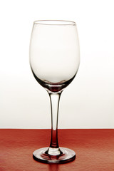 wine glasses on a colored background.