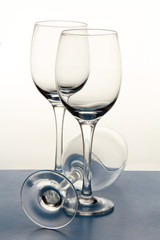 wine glasses on a colored background.