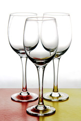 wine glasses on a colored background.