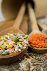 Wooden spoons with different kinds of groats