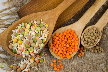 Wooden spoons with different kinds of groats