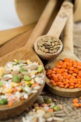 Wooden spoons with different kinds of groats