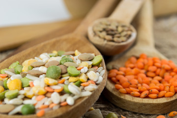 Wooden spoons with different kinds of groats