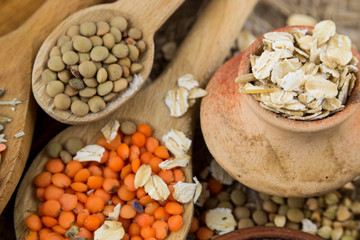 Wooden spoons with different kinds of groats