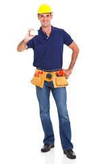 smiling handyman holding his business card