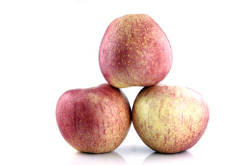 Three Red apple on white background.