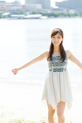 Beautiful asian woman on beach summer holiday