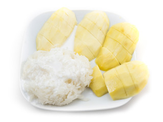 Glutinous rice with mangoes isolated on white
