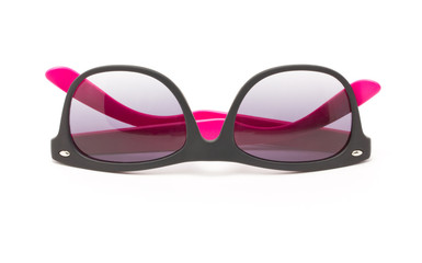 Women's pink and black sun glasses isolated on white background. © sirikornt