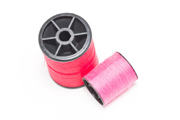 Spool of thread isolated on white background.