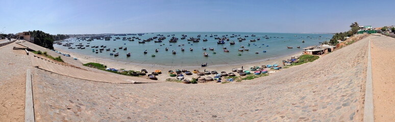 Fototapeta na wymiar Panorama with fishing boats in Mui Ne, Vietnam