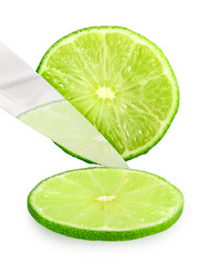Fototapeta na wymiar Cutting fresh green lime