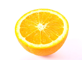 Half of orange navel orange, fruit and juice.