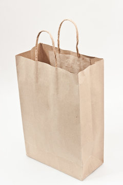brown paper bag with white background