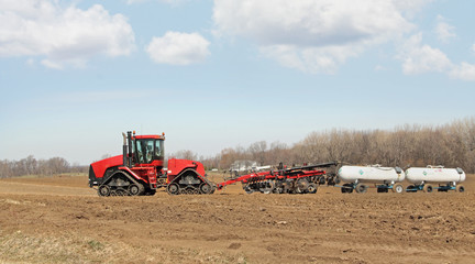 Obraz premium Plowing and Fertilizing