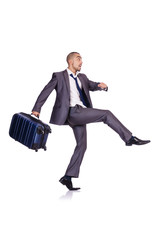 Businessman with luggage on white